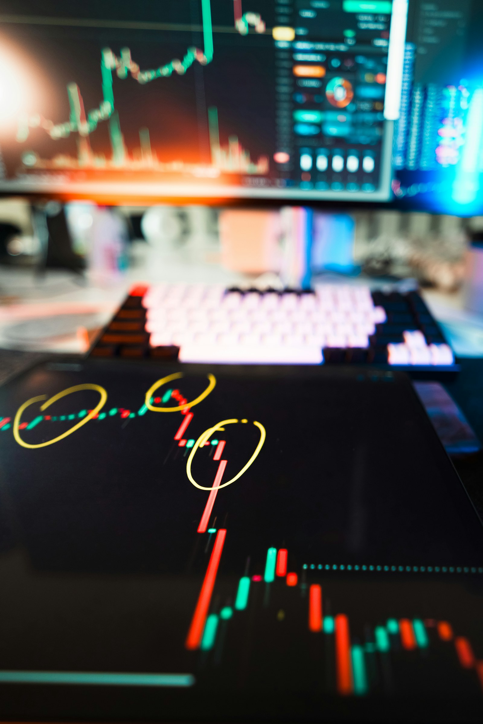 Financial forecast charts displayed across digital screens